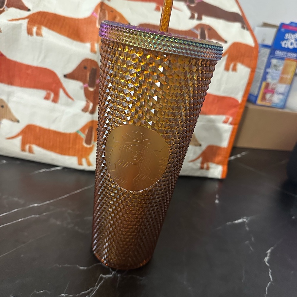 Starbucks limited edition 50th anniversary gold cup.